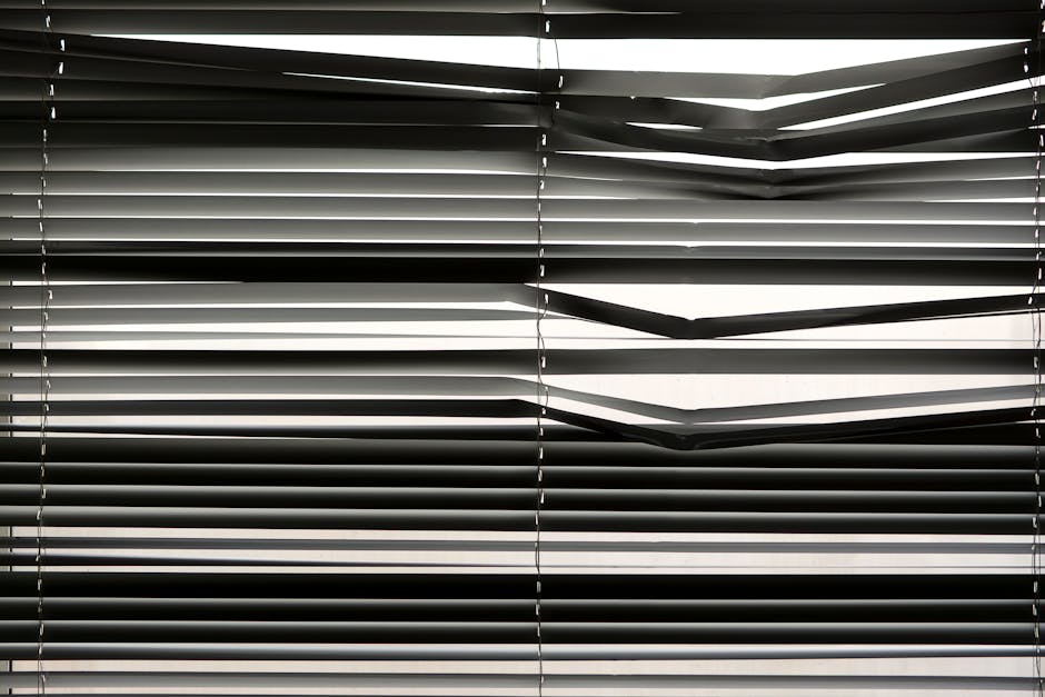Motorized roller shades providing light filtering in a bright room