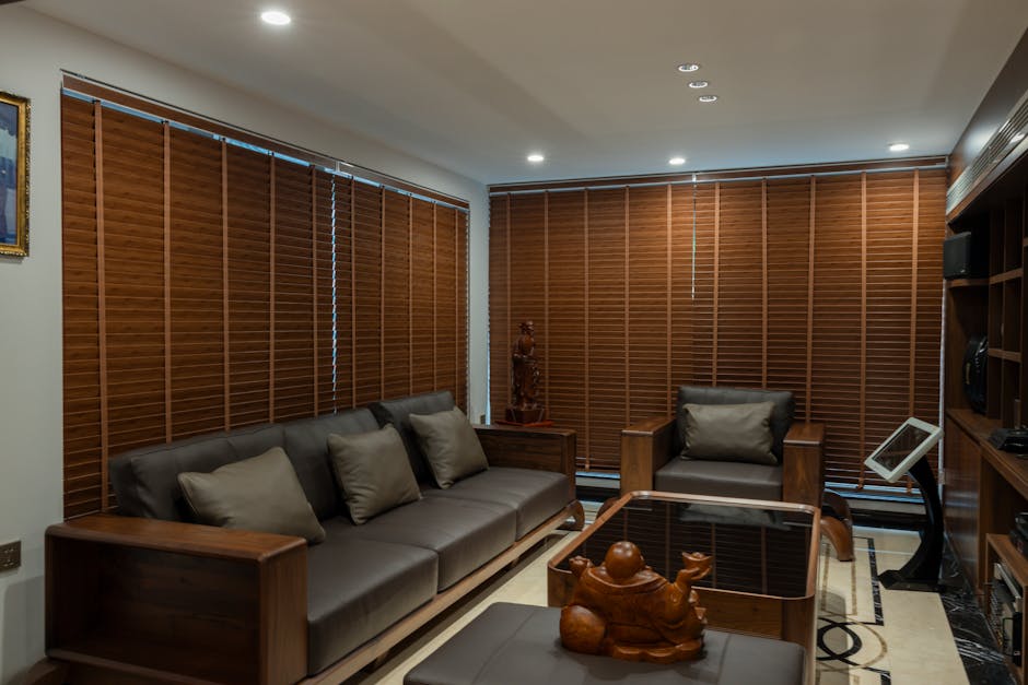 Modern living room with custom window blinds and elegant styling